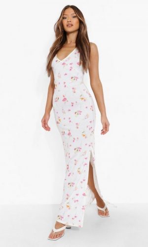 Довга сукня з глибоким вирізом з низу та квітковим принтом 